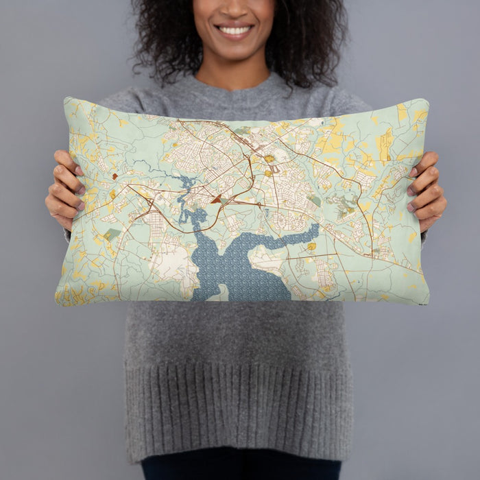 Person holding 20x12 Custom Jacksonville North Carolina Map Throw Pillow in Woodblock