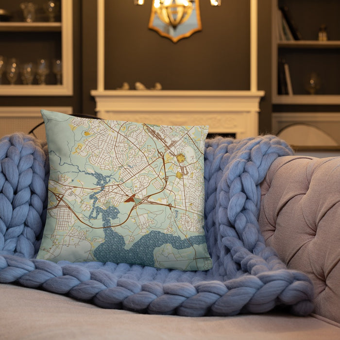 Custom Jacksonville North Carolina Map Throw Pillow in Woodblock on Cream Colored Couch