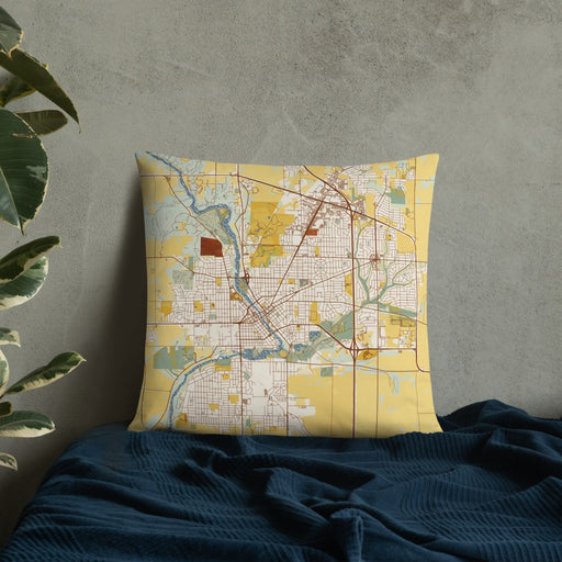 Custom Janesville Wisconsin Map Throw Pillow in Woodblock on Bedding Against Wall