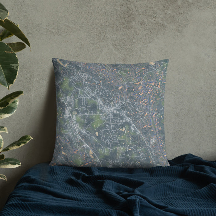 Custom Jasper Georgia Map Throw Pillow in Afternoon on Bedding Against Wall