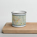 Front View Custom Jasper Georgia Map Enamel Mug in Woodblock on Cutting Board