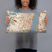 Person holding 20x12 Custom Jersey City New Jersey Map Throw Pillow in Woodblock