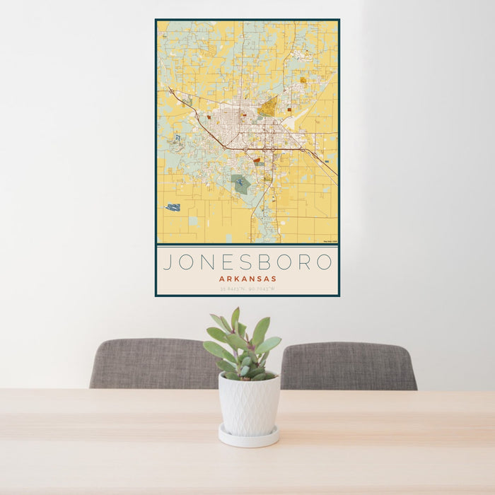24x36 Jonesboro Arkansas Map Print Portrait Orientation in Woodblock Style Behind 2 Chairs Table and Potted Plant