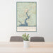 24x36 Jonestown Texas Map Print Portrait Orientation in Woodblock Style Behind 2 Chairs Table and Potted Plant