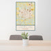 24x36 Joplin Missouri Map Print Portrait Orientation in Woodblock Style Behind 2 Chairs Table and Potted Plant