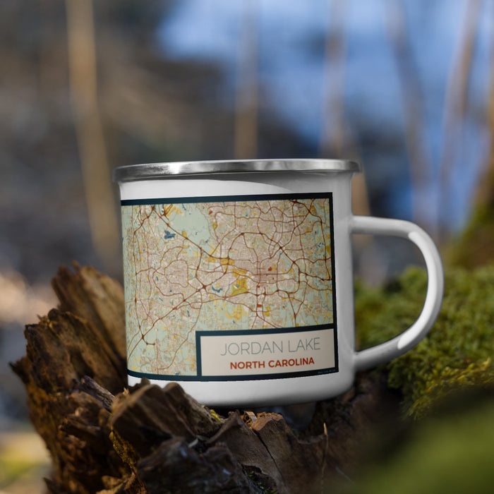 Right View Custom Jordan Lake North Carolina Map Enamel Mug in Woodblock on Grass With Trees in Background