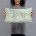 Person holding 20x12 Custom Joshua Tree National Park Map Throw Pillow in Woodblock