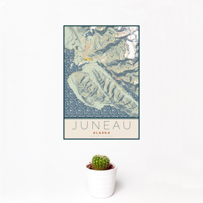 12x18 Juneau Alaska Map Print Portrait Orientation in Woodblock Style With Small Cactus Plant in White Planter