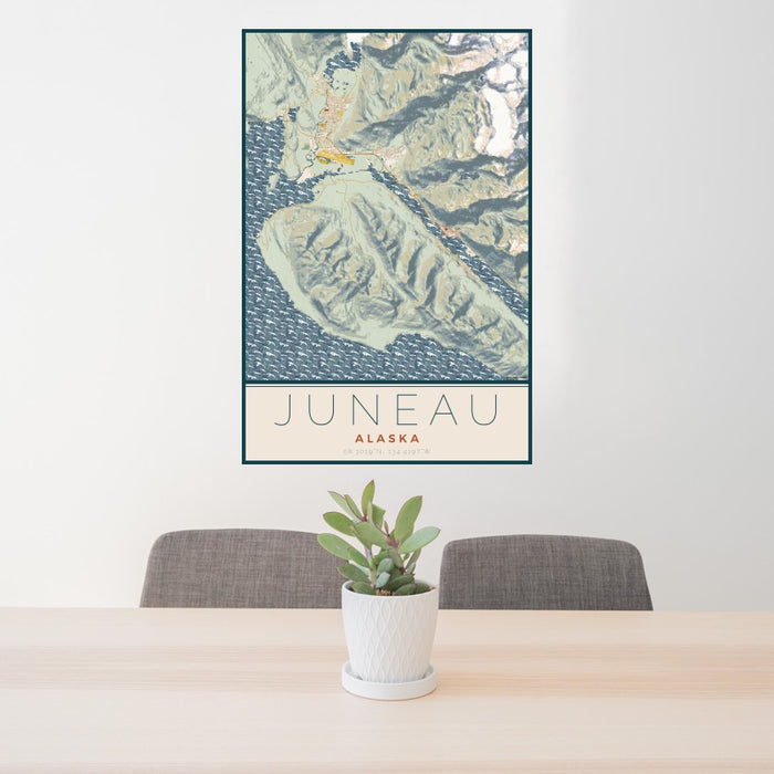 24x36 Juneau Alaska Map Print Portrait Orientation in Woodblock Style Behind 2 Chairs Table and Potted Plant