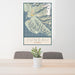 24x36 Juneau Alaska Map Print Portrait Orientation in Woodblock Style Behind 2 Chairs Table and Potted Plant