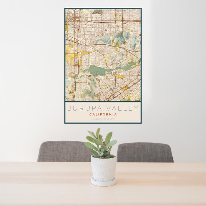 24x36 Jurupa Valley California Map Print Portrait Orientation in Woodblock Style Behind 2 Chairs Table and Potted Plant