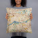 Person holding 18x18 Custom Jurupa Valley California Map Throw Pillow in Woodblock