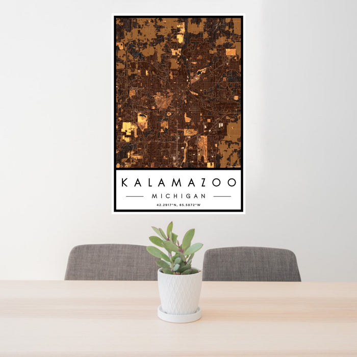 24x36 Kalamazoo Michigan Map Print Portrait Orientation in Ember Style Behind 2 Chairs Table and Potted Plant