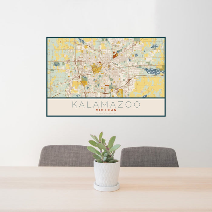 24x36 Kalamazoo Michigan Map Print Landscape Orientation in Woodblock Style Behind 2 Chairs Table and Potted Plant