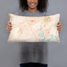 Person holding 20x12 Custom Kalispell Montana Map Throw Pillow in Watercolor