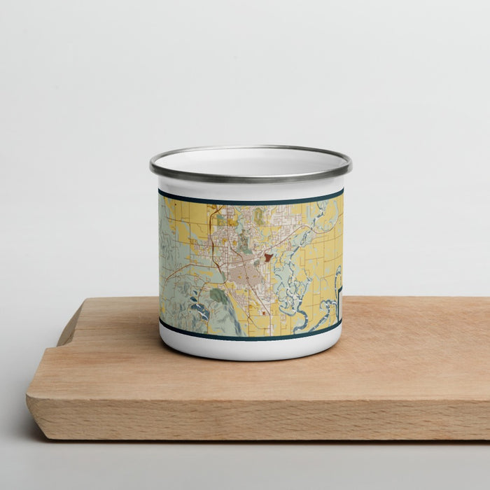 Front View Custom Kalispell Montana Map Enamel Mug in Woodblock on Cutting Board