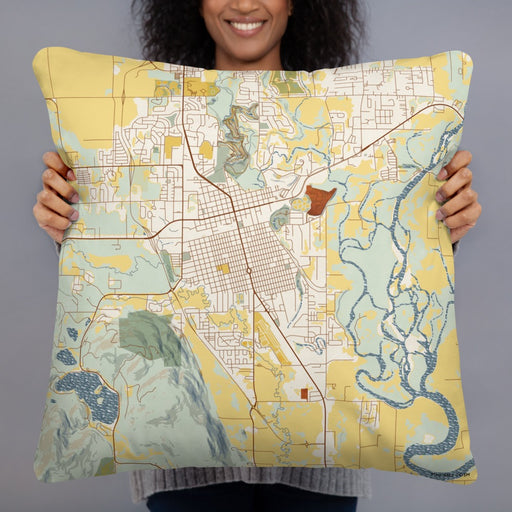 Person holding 22x22 Custom Kalispell Montana Map Throw Pillow in Woodblock