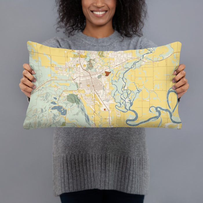 Person holding 20x12 Custom Kalispell Montana Map Throw Pillow in Woodblock