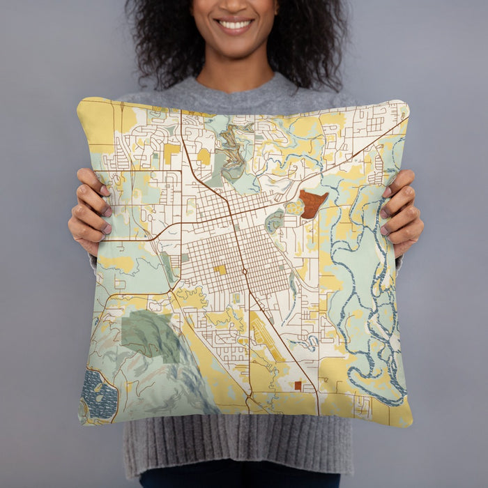 Person holding 18x18 Custom Kalispell Montana Map Throw Pillow in Woodblock