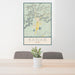 24x36 Kanab Utah Map Print Portrait Orientation in Woodblock Style Behind 2 Chairs Table and Potted Plant