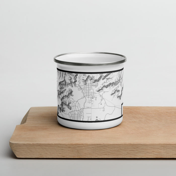 Front View Custom Kanab Utah Map Enamel Mug in Classic on Cutting Board