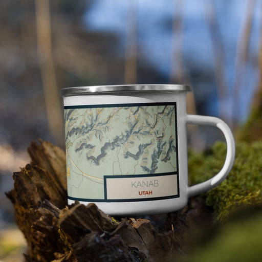 Right View Custom Kanab Utah Map Enamel Mug in Woodblock on Grass With Trees in Background