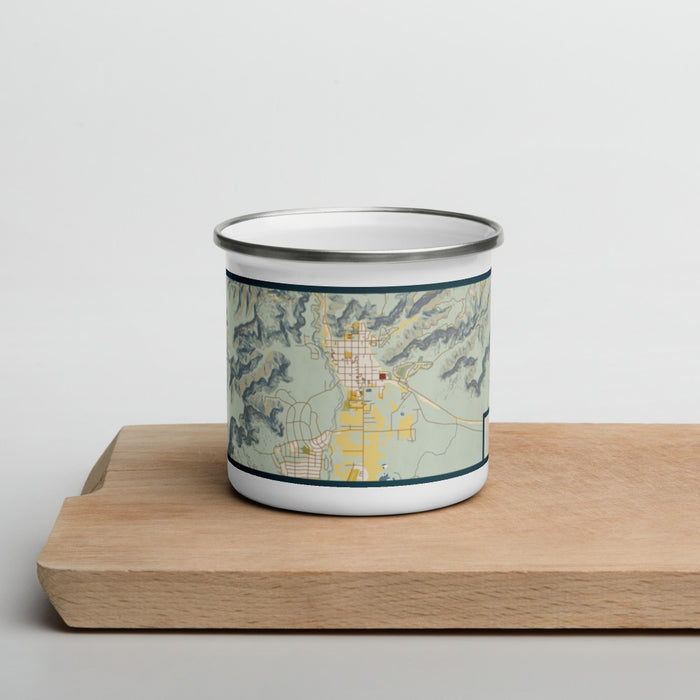 Front View Custom Kanab Utah Map Enamel Mug in Woodblock on Cutting Board
