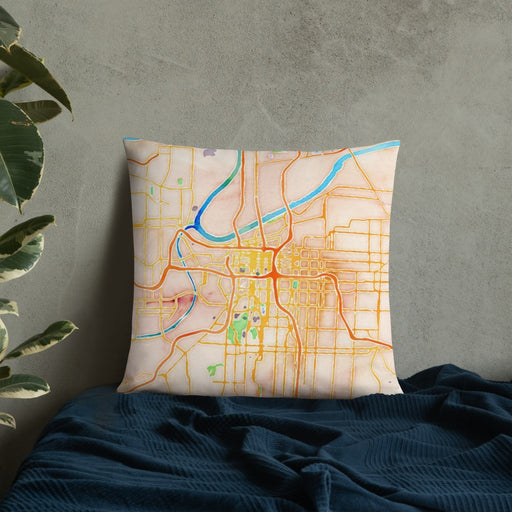 Custom Kansas City Missouri Map Throw Pillow in Watercolor on Bedding Against Wall