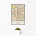 12x18 Kansas City Missouri Map Print Portrait Orientation in Woodblock Style With Small Cactus Plant in White Planter