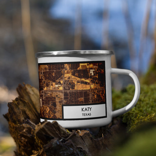 Right View Custom Katy Texas Map Enamel Mug in Ember on Grass With Trees in Background