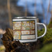 Right View Custom Katy Texas Map Enamel Mug in Woodblock on Grass With Trees in Background