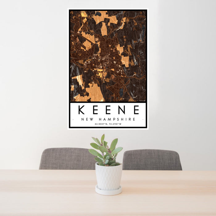 24x36 Keene New Hampshire Map Print Portrait Orientation in Ember Style Behind 2 Chairs Table and Potted Plant