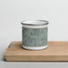 Front View Custom Keller Texas Map Enamel Mug in Afternoon on Cutting Board