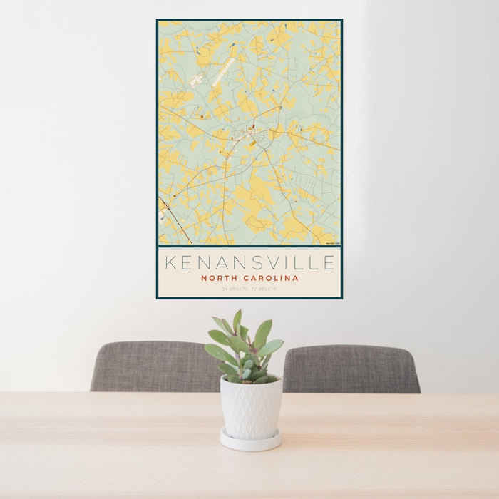 24x36 Kenansville North Carolina Map Print Portrait Orientation in Woodblock Style Behind 2 Chairs Table and Potted Plant