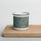 Front View Custom Kent Connecticut Map Enamel Mug in Afternoon on Cutting Board