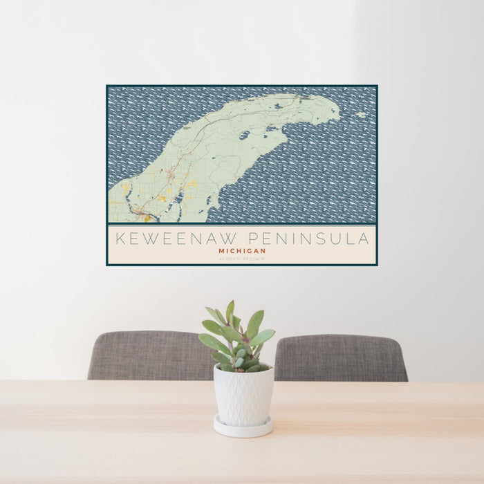 24x36 Keweenaw Peninsula Michigan Map Print Lanscape Orientation in Woodblock Style Behind 2 Chairs Table and Potted Plant