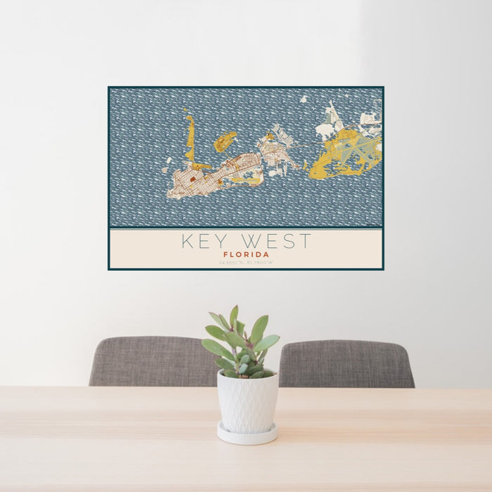 24x36 Key West Florida Map Print Lanscape Orientation in Woodblock Style Behind 2 Chairs Table and Potted Plant