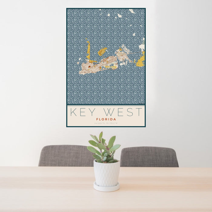 24x36 Key West Florida Map Print Portrait Orientation in Woodblock Style Behind 2 Chairs Table and Potted Plant