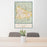 24x36 Kigali Rwanda Map Print Portrait Orientation in Woodblock Style Behind 2 Chairs Table and Potted Plant