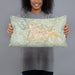 Person holding 20x12 Custom Kigali Rwanda Map Throw Pillow in Woodblock