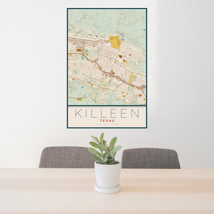 24x36 Killeen Texas Map Print Portrait Orientation in Woodblock Style Behind 2 Chairs Table and Potted Plant