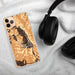 Custom Killington Vermont Map Phone Case in Ember on Table with Black Headphones