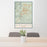 24x36 Kingman Arizona Map Print Portrait Orientation in Woodblock Style Behind 2 Chairs Table and Potted Plant