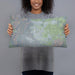 Person holding 20x12 Custom Kingman Arizona Map Throw Pillow in Afternoon