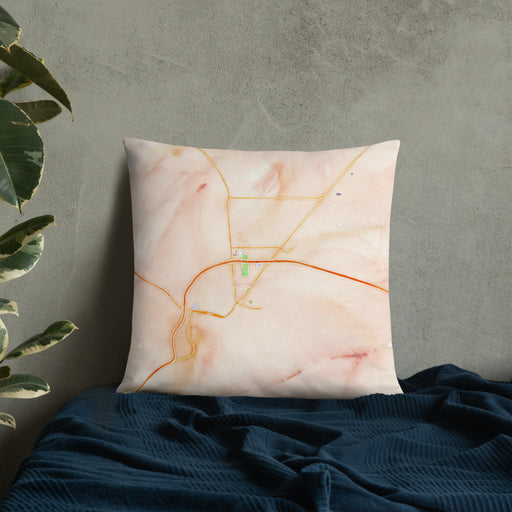 Custom Kingman Arizona Map Throw Pillow in Watercolor on Bedding Against Wall
