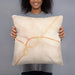 Person holding 18x18 Custom Kingman Arizona Map Throw Pillow in Watercolor