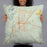 Person holding 22x22 Custom Kingman Arizona Map Throw Pillow in Woodblock