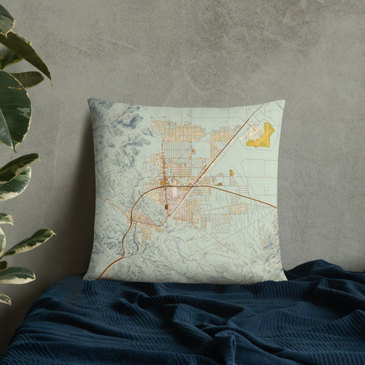 Custom Kingman Arizona Map Throw Pillow in Woodblock on Bedding Against Wall