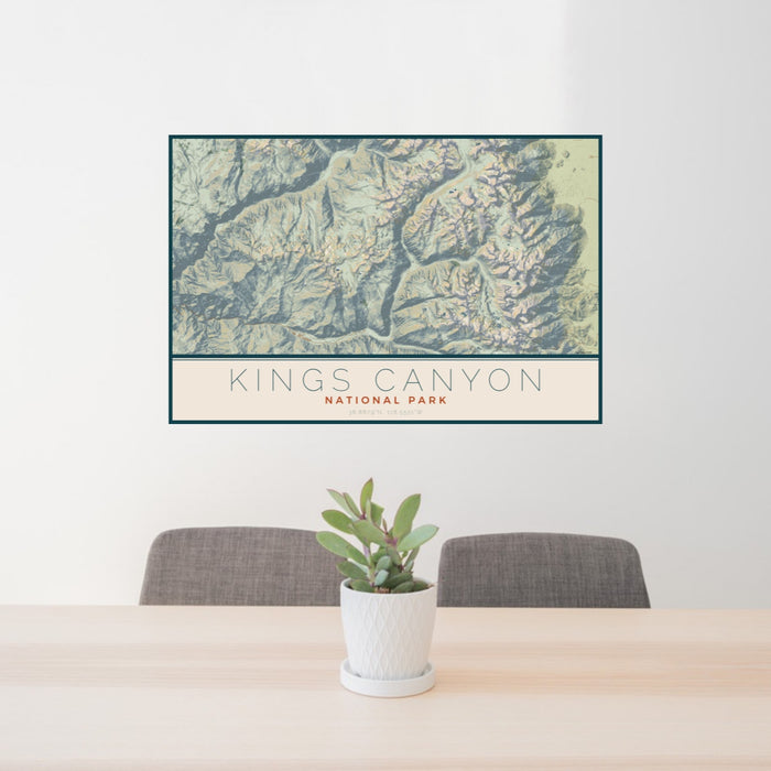 24x36 Kings Canyon National Park Map Print Lanscape Orientation in Woodblock Style Behind 2 Chairs Table and Potted Plant
