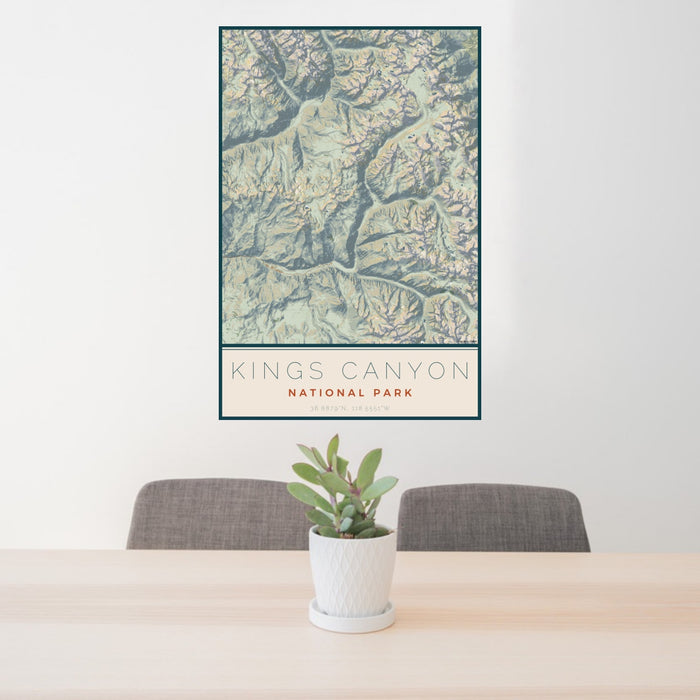 24x36 Kings Canyon National Park Map Print Portrait Orientation in Woodblock Style Behind 2 Chairs Table and Potted Plant